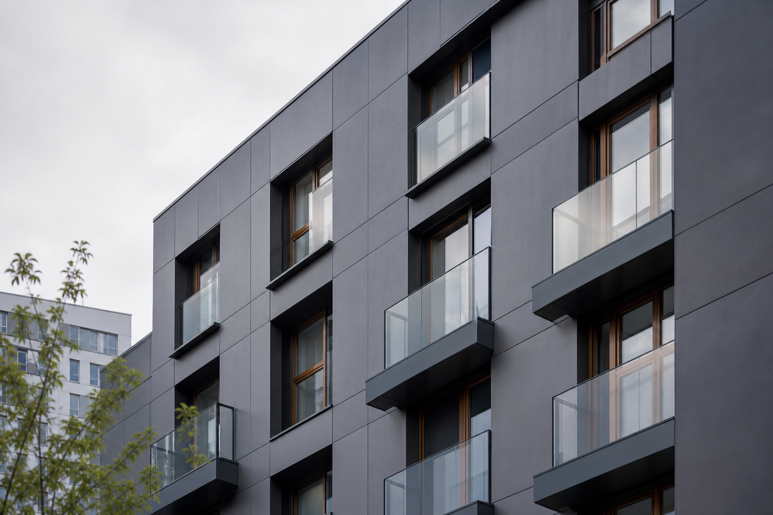 Modern ventilated facade with fibre-cement cladding on a Warsaw residential building