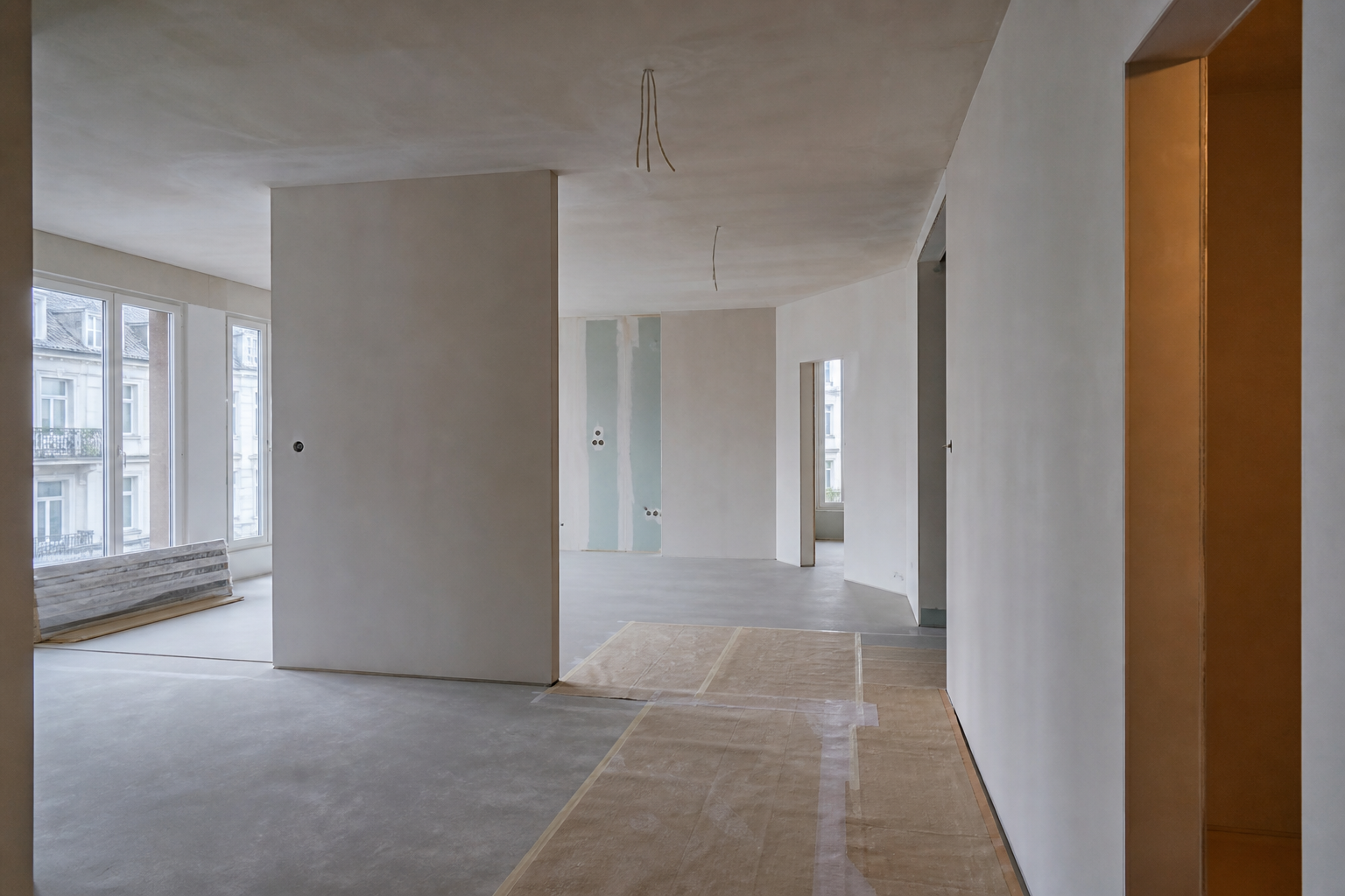 Apartment interior renovation with new partition walls and leveled screed floor